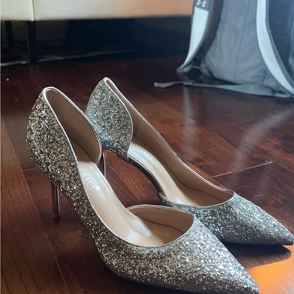 Sparkly silver heels, never worn.